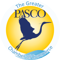 A picture of the pasco chamber logo.